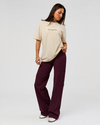 Woman wearing VS1 Enjoy The Journey FLXCotton Oversize Tee - Vanilla Bean | Model:Bianca | Size:XS | Thumbnail Index: 7