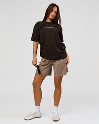 Woman wearing VS6 1% Better FLXCotton Oversize Tee - Ground Coffee | Model:Bianca | Size:XS | Thumbnail Index: 6