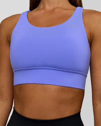 Woman wearing Accelerate Sports Bra - Bluebell | Model:Brylee | Size:XS | Thumbnail Index: 0