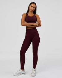 Woman wearing Accelerate Sports Bra - Cherry Lacquer | Model:Brylee | Size:XS | Thumbnail Index: 3