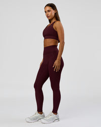 Woman wearing Accelerate Sports Bra - Cherry Lacquer | Model:Brylee | Size:XS | Thumbnail Index: 4