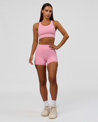Woman wearing Accelerate Sports Bra - Pink Rose | Model:Brylee | Size:XS | Thumbnail Index: 6