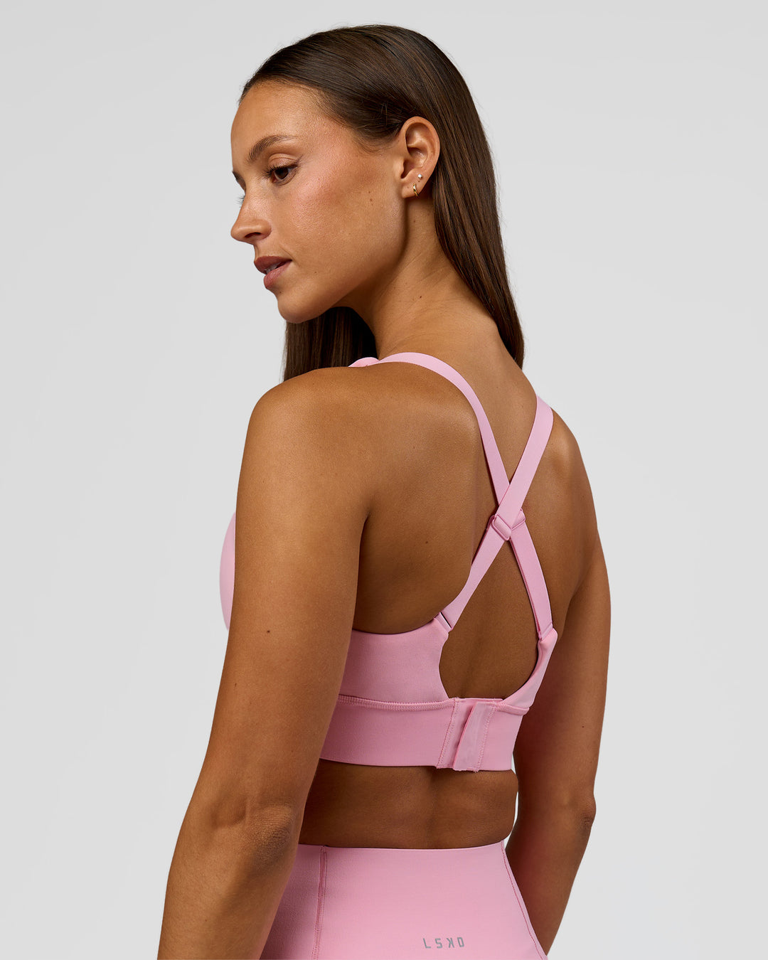 Woman wearing Accelerate Sports Bra - Pink Rose | Model:Brylee | Size:XS - view 9