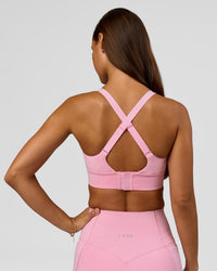 Woman wearing Accelerate Sports Bra - Pink Rose | Model:Brylee | Size:XS | Thumbnail Index: 3