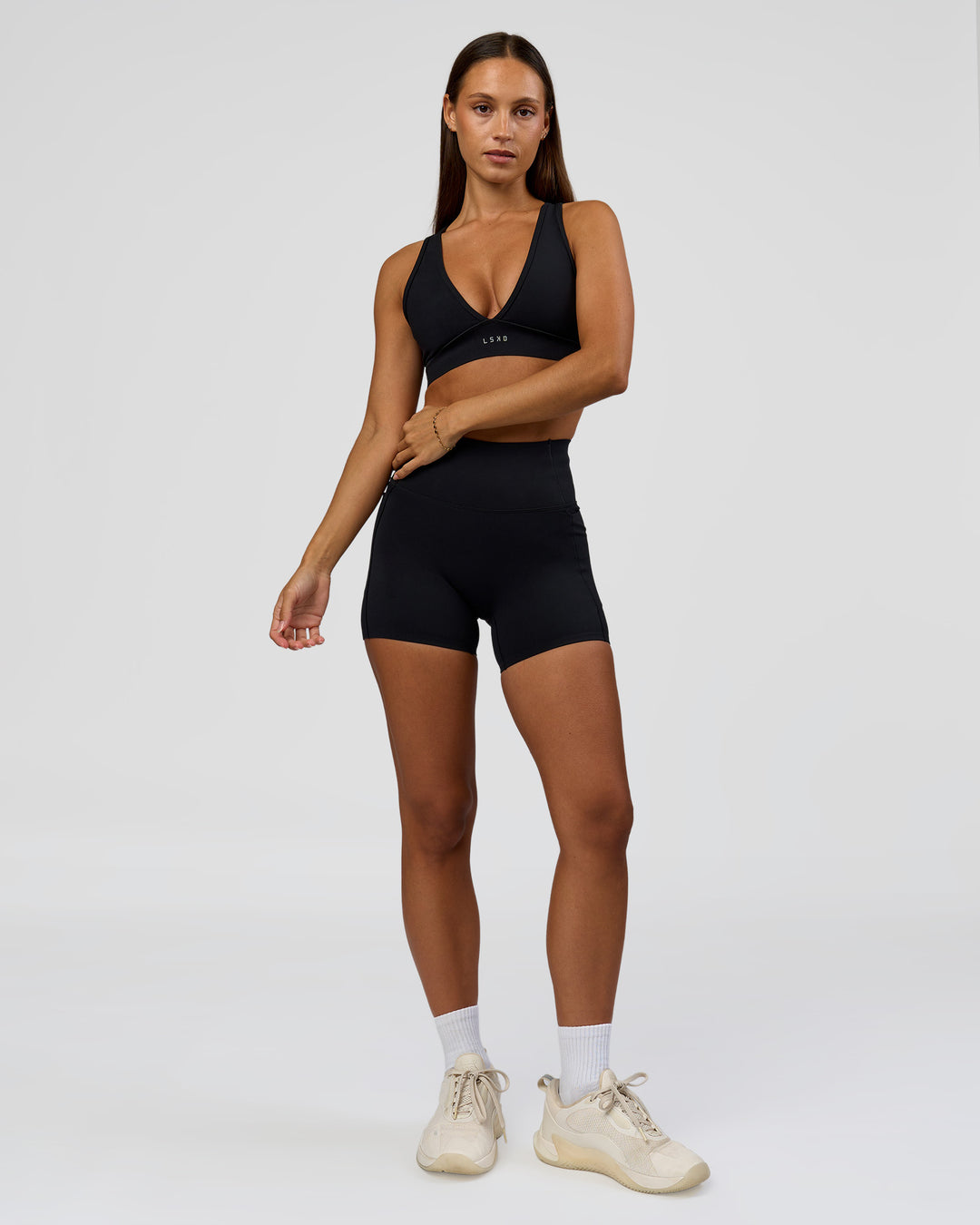 Woman wearing Fusion Bonded High-Rise 4" Short Pockets - Black | Model:Brylee | Size:XS - view 4