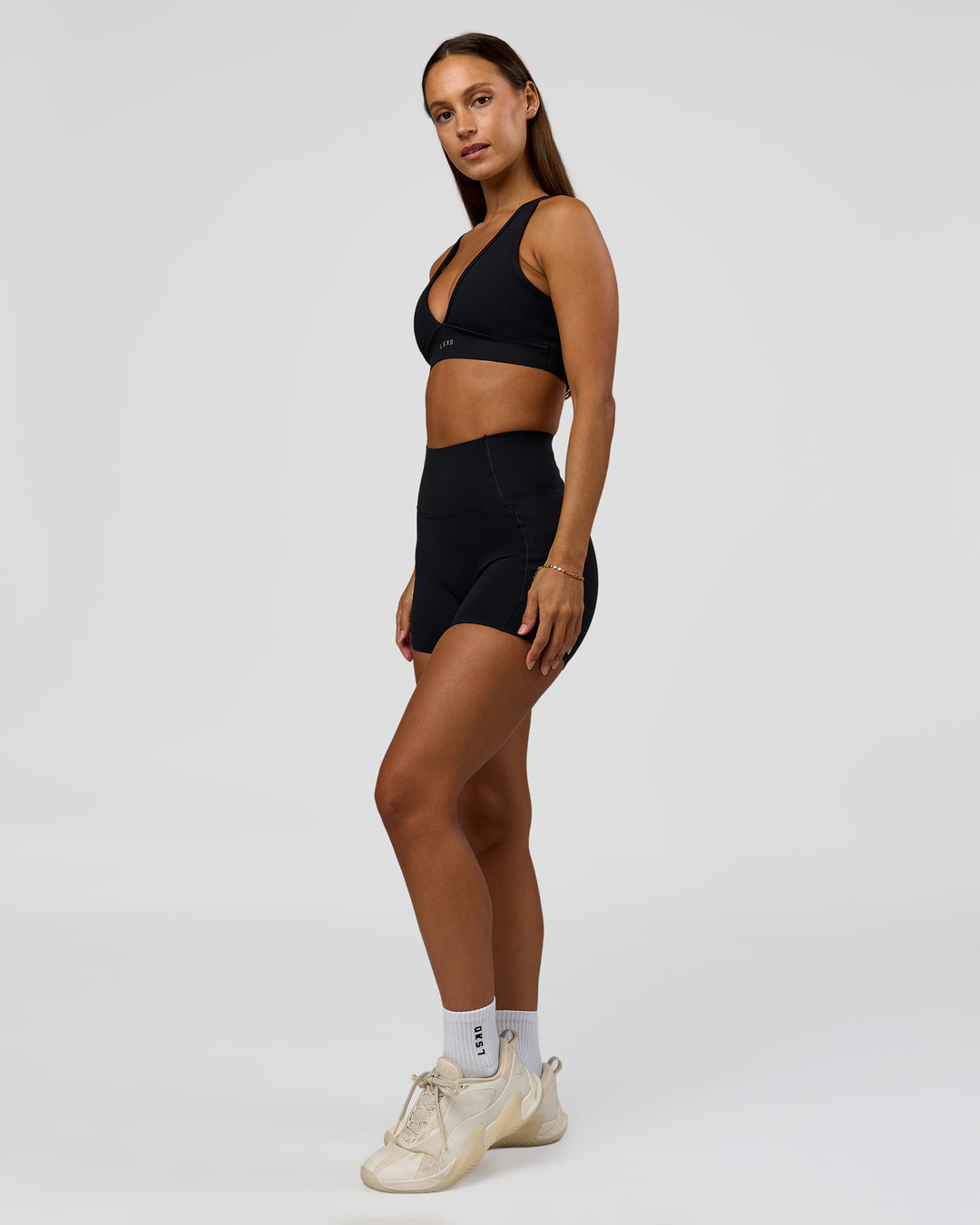 Woman wearing Fusion Bonded High-Rise 4" Short Pockets - Black | Model:Brylee | Size:XS - view 8
