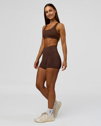 Woman wearing Fusion Bonded High-Rise 4" Short Pockets - Hot Chocolate | Model:Brylee | Size:XS | Thumbnail Index: 3