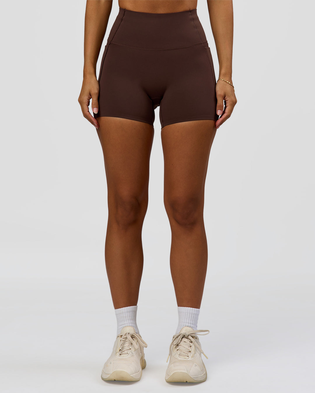 Woman wearing Fusion Bonded High-Rise 4" Short Pockets - Hot Chocolate | Model:Brylee | Size:XS - view 5