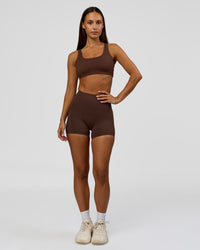Woman wearing Fusion Bonded High-Rise 4" Short Pockets - Hot Chocolate | Model:Brylee | Size:XS | Thumbnail Index: 5