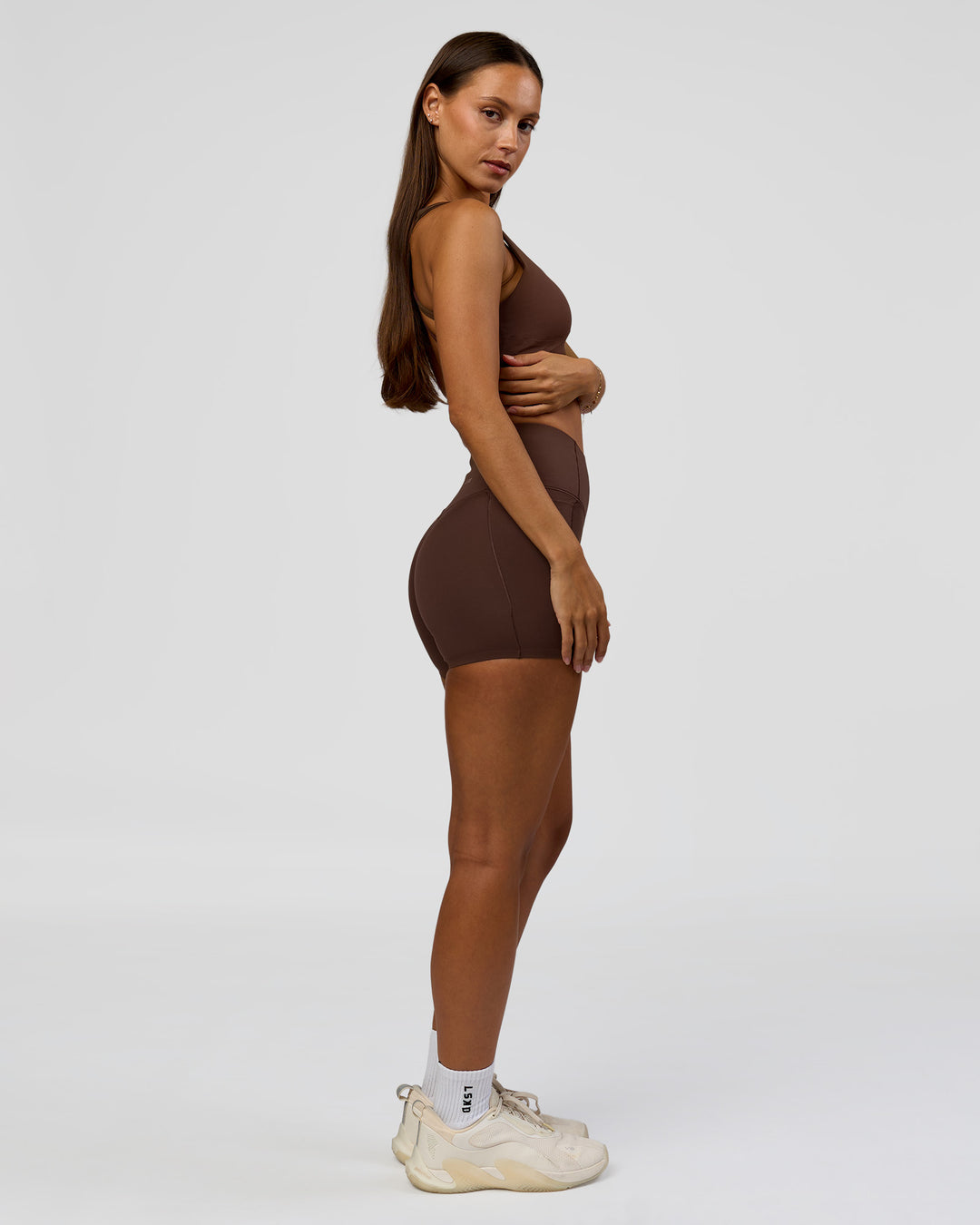 Woman wearing Fusion Bonded High-Rise 4" Short Pockets - Hot Chocolate | Model:Brylee | Size:XS - view 8