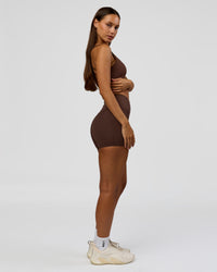 Woman wearing Fusion Bonded High-Rise 4" Short Pockets - Hot Chocolate | Model:Brylee | Size:XS | Thumbnail Index: 7