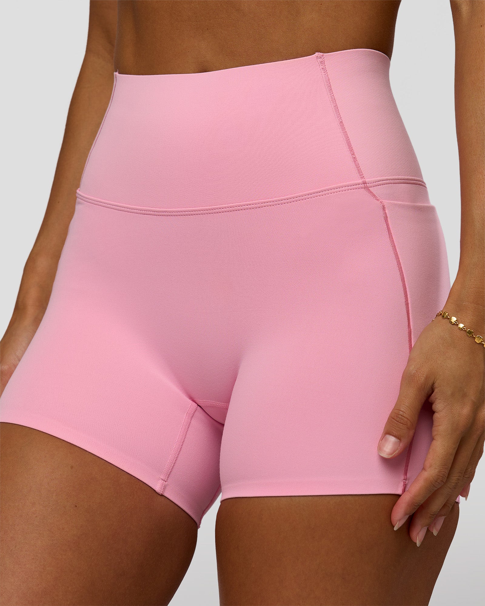 Woman wearing Fusion Bonded High-Rise 4" Short Pockets - Pink Rose | Model:Brylee | Size:XS