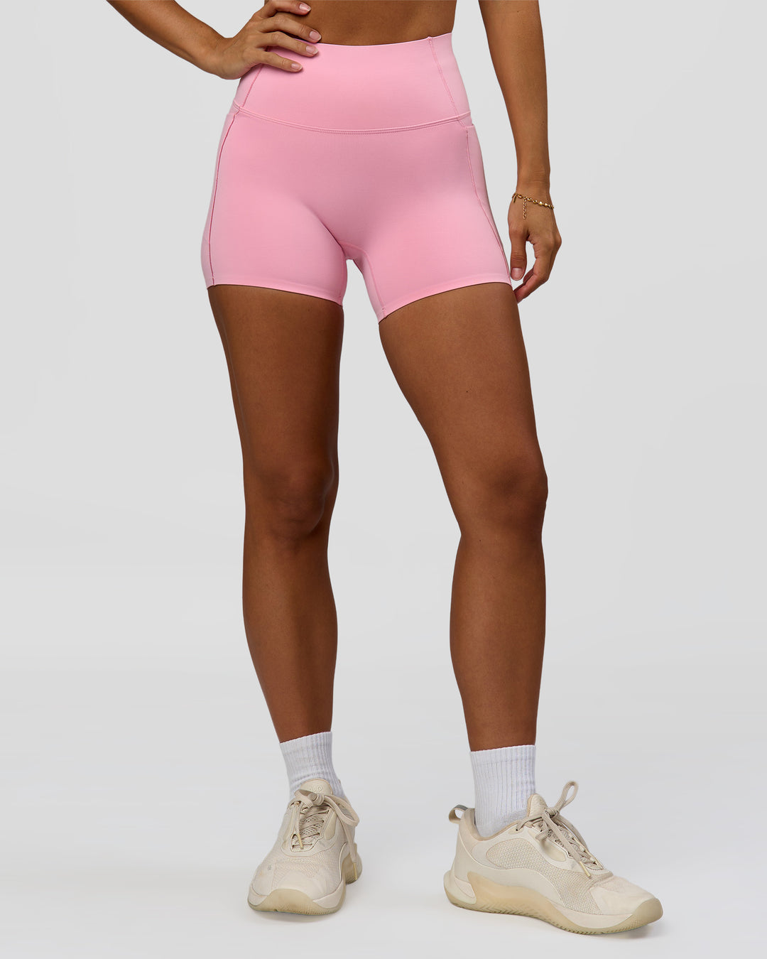 Woman wearing Fusion Bonded High-Rise 4" Short Pockets - Pink Rose | Model:Brylee | Size:XS - view 3