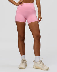Woman wearing Fusion Bonded High-Rise 4" Short Pockets - Pink Rose | Model:Brylee | Size:XS | Thumbnail Index: 2