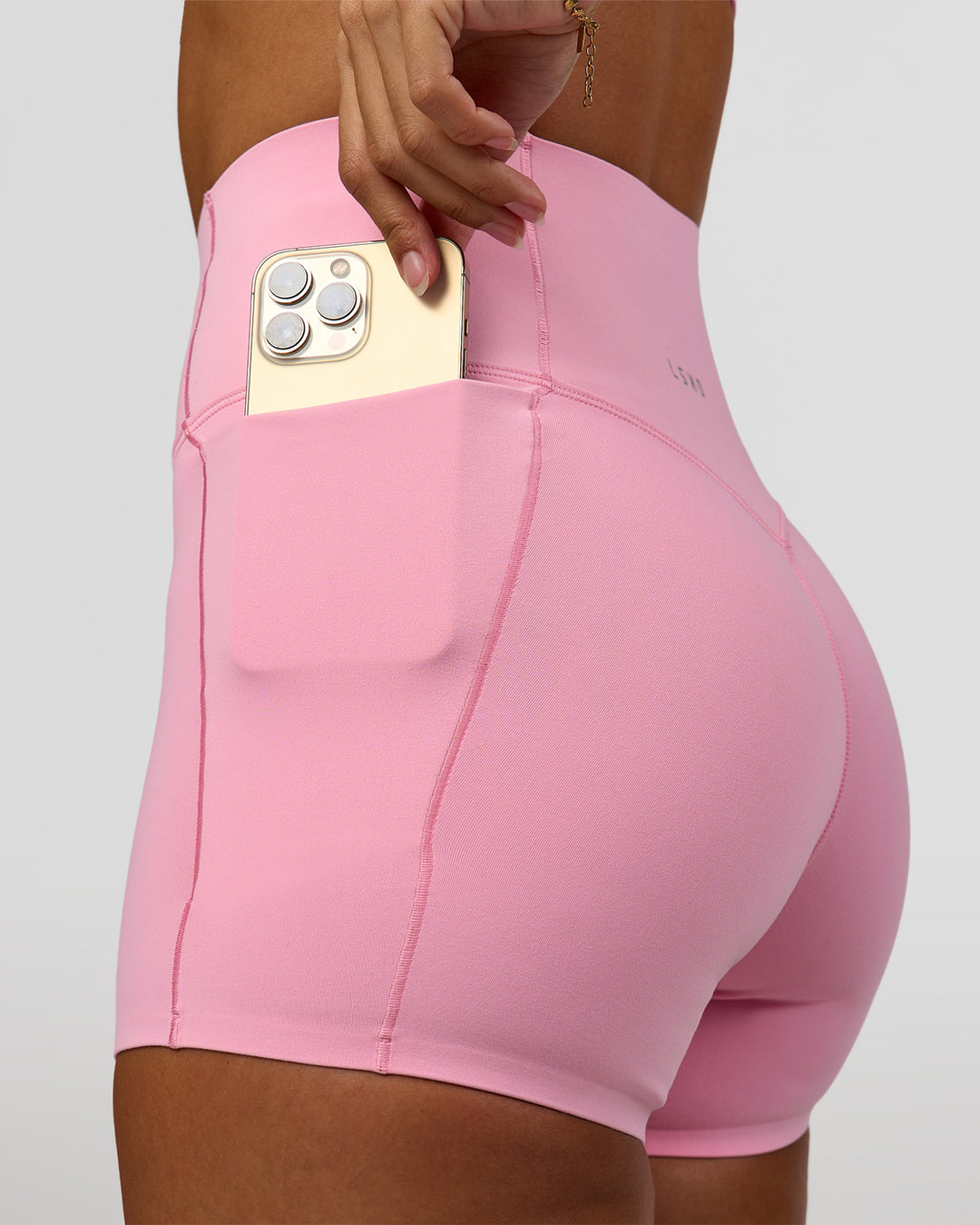 Woman wearing Fusion Bonded High-Rise 4" Short Pockets - Pink Rose | Model:Brylee | Size:XS - view 7