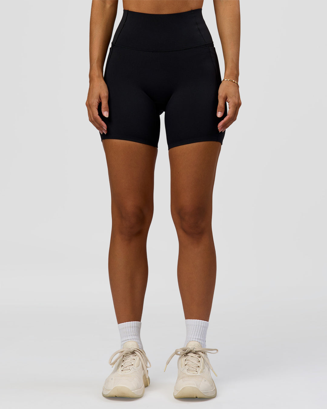 Woman wearing Fusion Bonded High-Rise 6" Short Pockets - Black | Model:Brylee | Size:XS - view 6