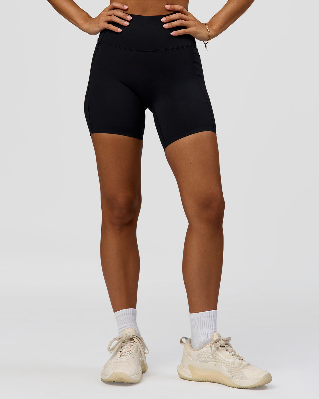Woman wearing Fusion Bonded High-Rise 6" Short Pockets - Black | Model:Brylee | Size:XS - view 7