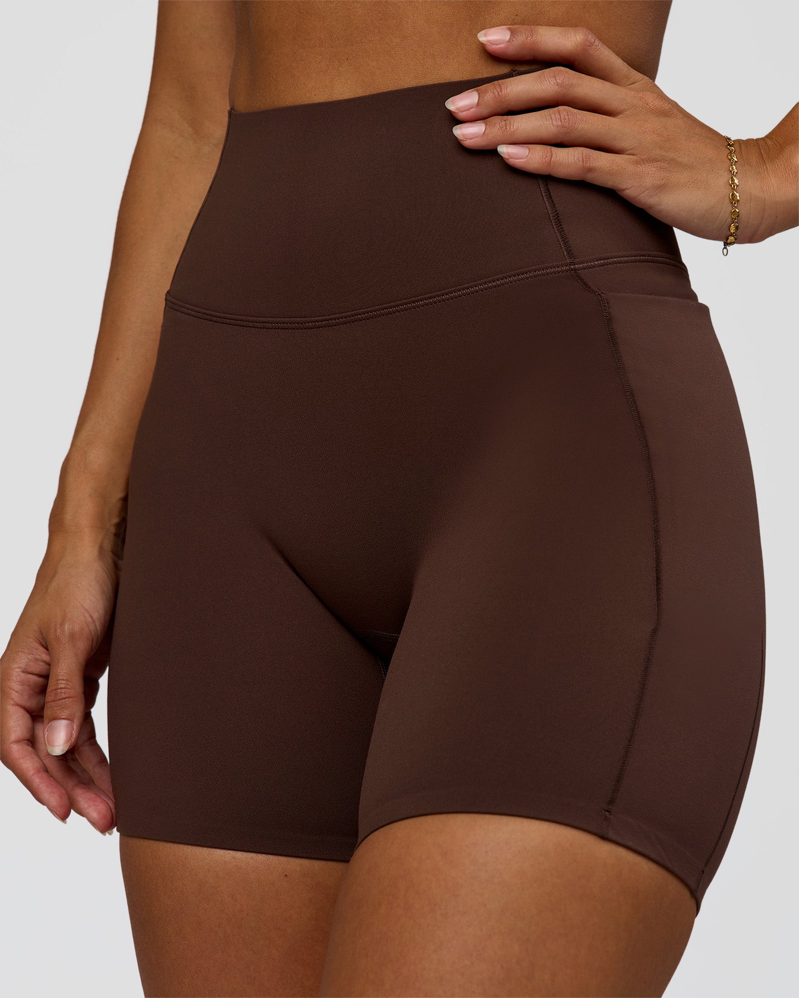 Woman wearing Fusion Bonded High-Rise 6" Short Pockets - Hot Chocolate | Model:Brylee | Size:XS