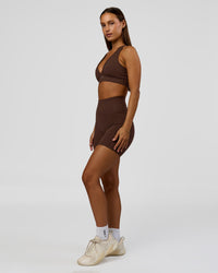 Woman wearing Fusion Bonded High-Rise 6" Short Pockets - Hot Chocolate | Model:Brylee | Size:XS | Thumbnail Index: 2