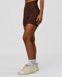 Woman wearing Fusion Bonded High-Rise 6" Short Pockets - Hot Chocolate | Model:Brylee | Size:XS | Thumbnail Index: 3