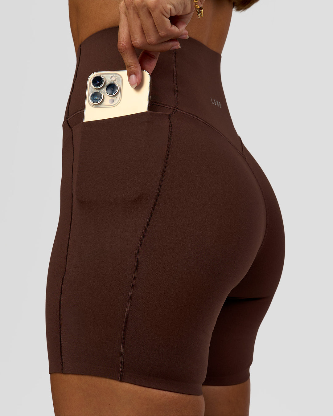 Woman wearing Fusion Bonded High-Rise 6" Short Pockets - Hot Chocolate | Model:Brylee | Size:XS - view 5