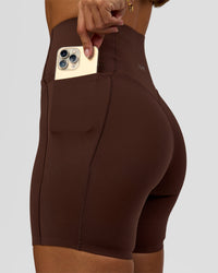 Woman wearing Fusion Bonded High-Rise 6" Short Pockets - Hot Chocolate | Model:Brylee | Size:XS | Thumbnail Index: 4