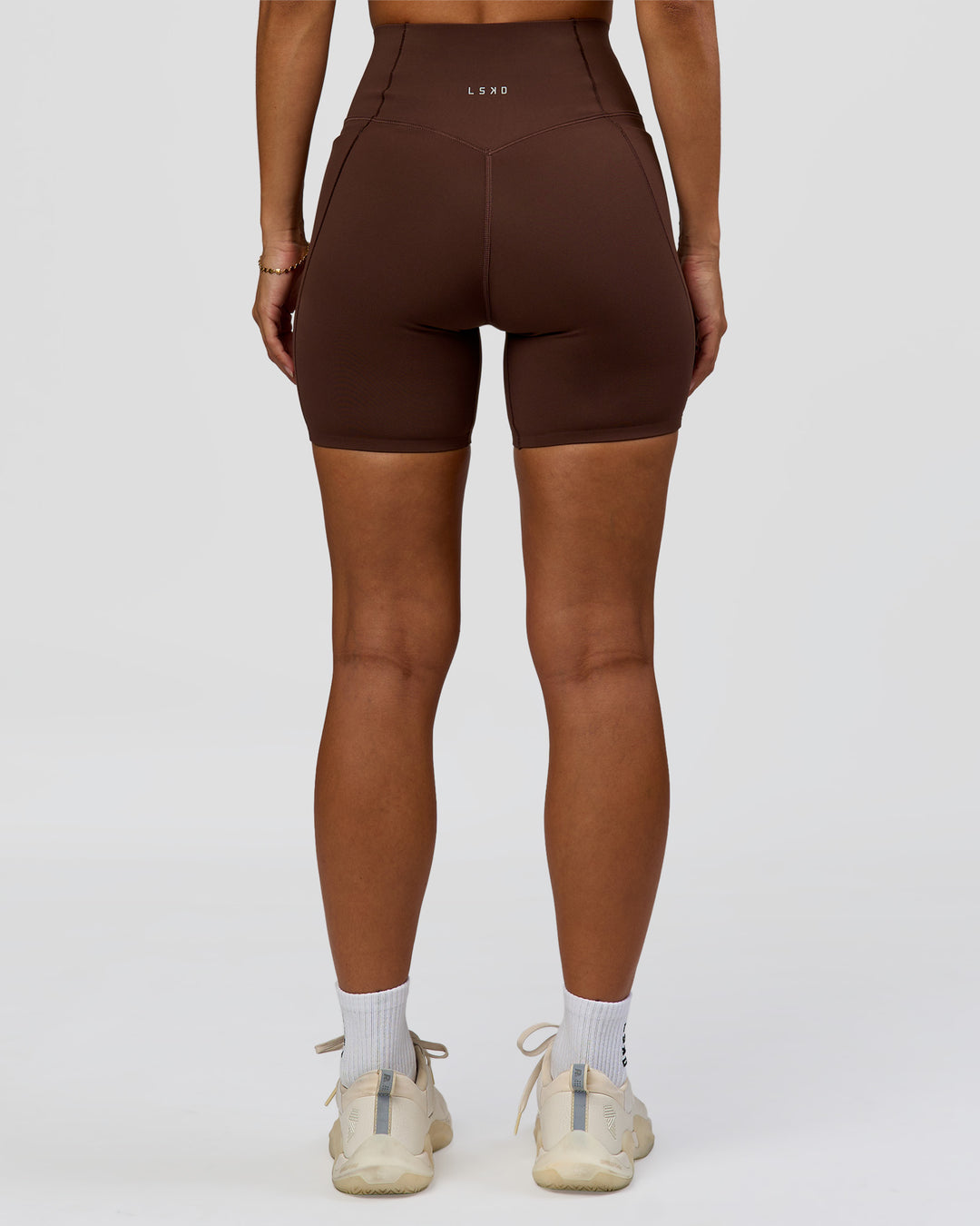Woman wearing Fusion Bonded High-Rise 6" Short Pockets - Hot Chocolate | Model:Brylee | Size:XS - view 7