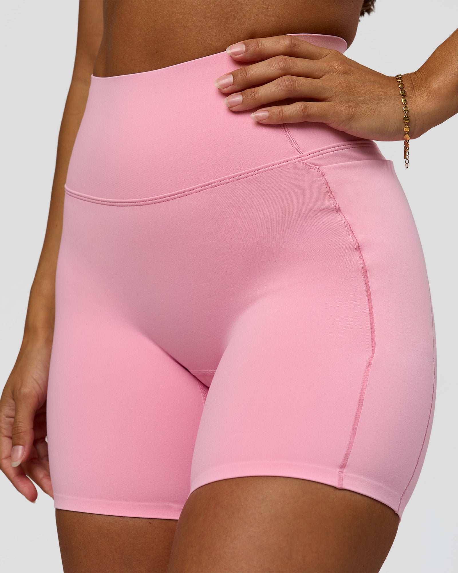 Woman wearing Fusion Bonded High-Rise 6" Short Pockets - Pink Rose | Model:Brylee | Size:XS