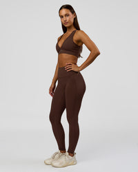 Woman wearing Fusion Bonded High-Rise Full Length Legging Pockets - Hot Chocolate | Model:Brylee | Size:XS | Thumbnail Index: 2