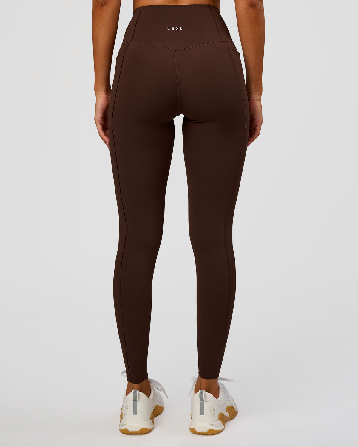 Woman wearing Fusion Bonded High-Rise Full Length Legging Pockets - Hot Chocolate | Model:Brylee | Size:XS - view 1