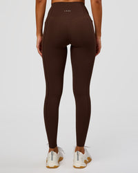 Woman wearing Fusion Bonded High-Rise Full Length Legging Pockets - Hot Chocolate | Model:Brylee | Size:XS | Thumbnail Index: 6