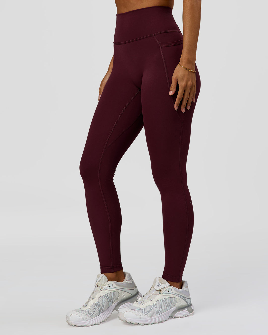 Woman wearing Fusion Ultra High-Rise Full Length Legging Pockets - Cherry Lacquer | Model:Brylee | Size:XS - view 1