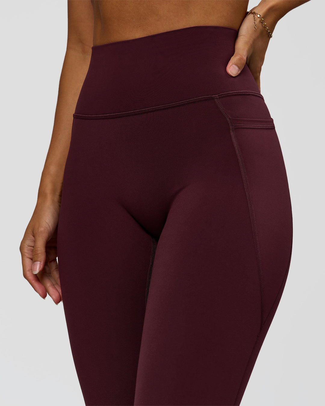 Woman wearing Fusion Ultra High-Rise Full Length Legging Pockets - Cherry Lacquer | Model:Brylee | Size:XS - view 2