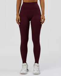 Woman wearing Fusion Ultra High-Rise Full Length Legging Pockets - Cherry Lacquer | Model:Brylee | Size:XS | Thumbnail Index: 3