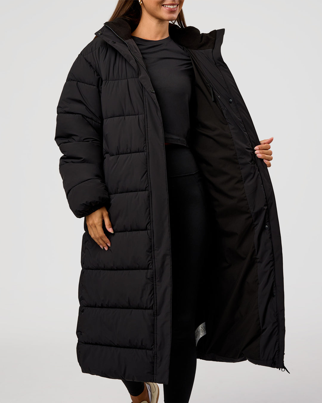 Woman wearing Go-To Puffer Long Jacket - Black | Model:Brylee | Size:XS - view 10