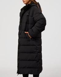 Woman wearing Go-To Puffer Long Jacket - Black | Model:Brylee | Size:XS | Thumbnail Index: 4