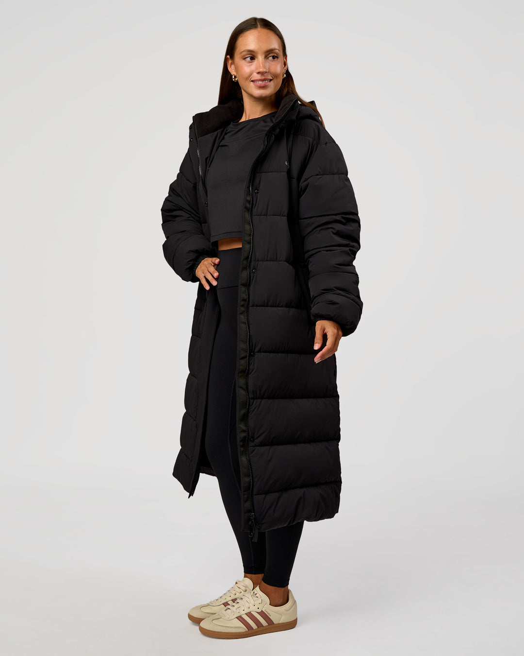 Woman wearing Go-To Puffer Long Jacket - Black | Model:Brylee | Size:XS - view 7