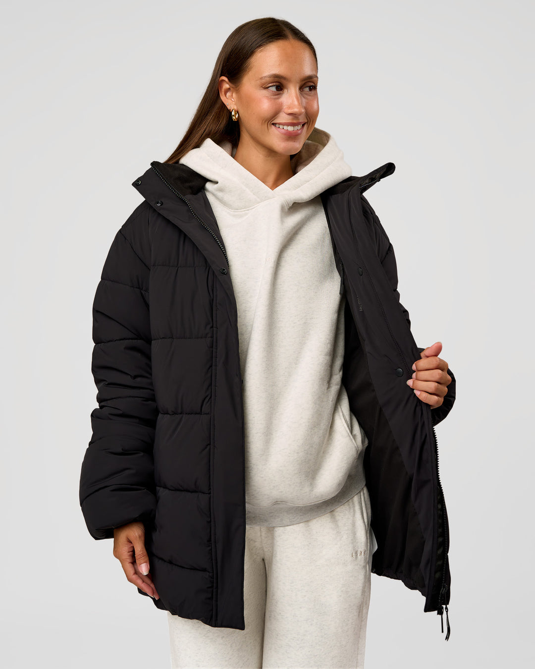 Woman wearing Go-To Puffer Mid Jacket - Black | Model:Brylee | Size:XS - view 5