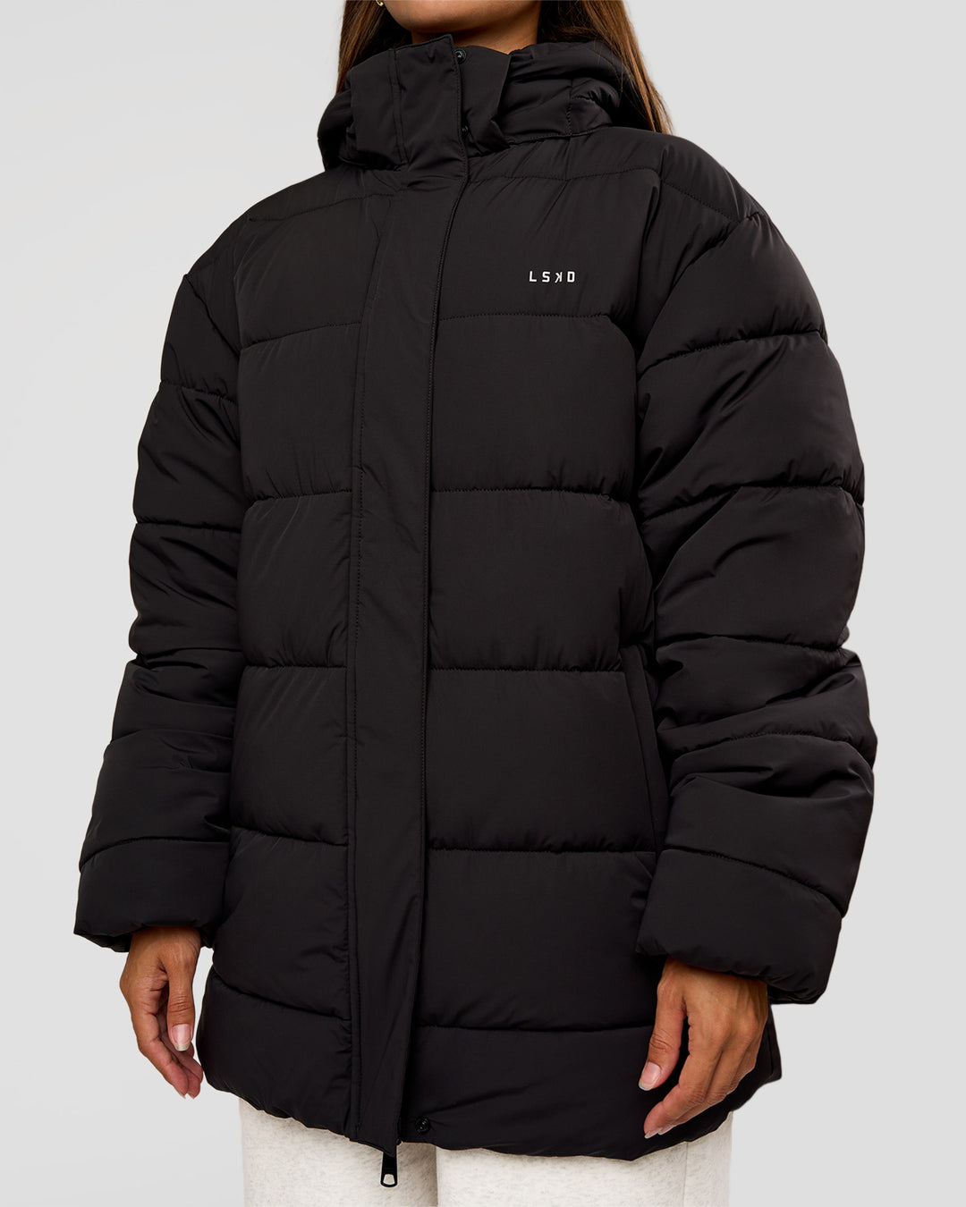 Woman wearing Go-To Puffer Mid Jacket - Black | Model:Brylee | Size:XS - view 9