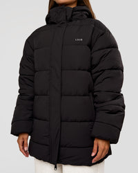 Woman wearing Go-To Puffer Mid Jacket - Black | Model:Brylee | Size:XS | Thumbnail Index: 8