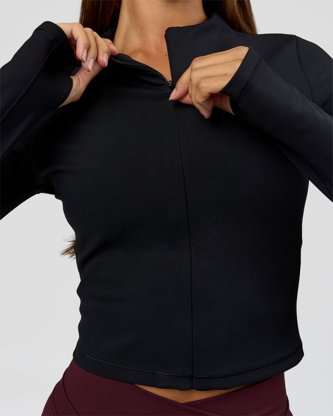 Woman wearing Sculpt Full Zip Long Sleeve Top - Black | Model:Brylee | Size:XS - view 4