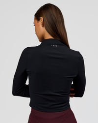 Woman wearing Sculpt Full Zip Long Sleeve Top - Black | Model:Brylee | Size:XS | Thumbnail Index: 10
