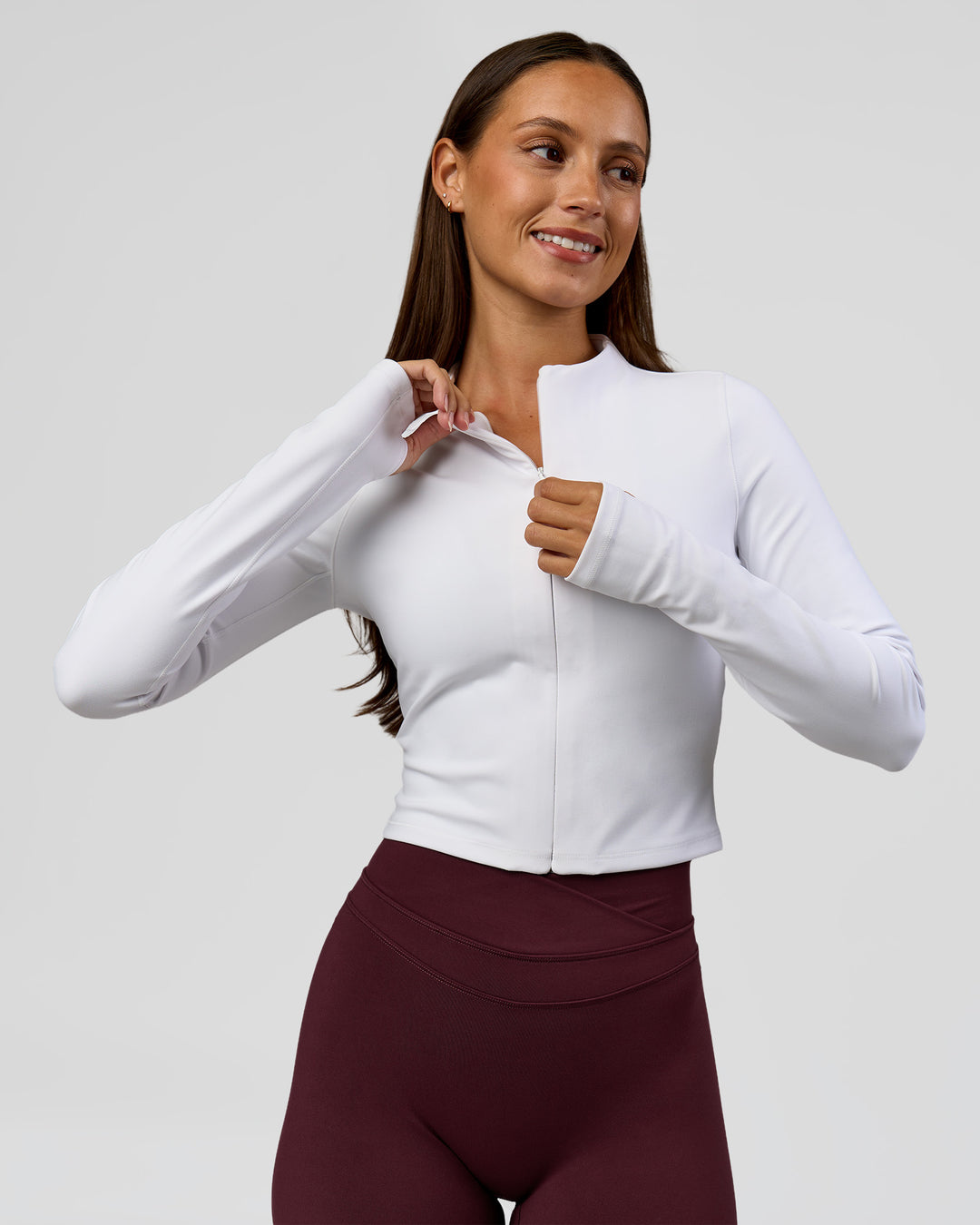 Woman wearing Sculpt Full Zip Long Sleeve Top - White | Model:Brylee | Size:XS - view 3