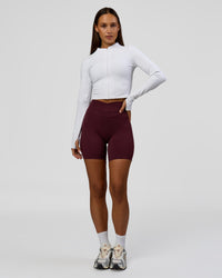 Woman wearing Sculpt Full Zip Long Sleeve Top - White | Model:Brylee | Size:XS | Thumbnail Index: 5