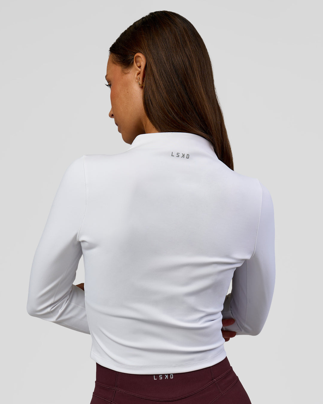 Woman wearing Sculpt Full Zip Long Sleeve Top - White | Model:Brylee | Size:XS - view 8