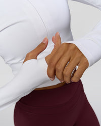 Woman wearing Sculpt Full Zip Long Sleeve Top - White | Model:Brylee | Size:XS | Thumbnail Index: 13