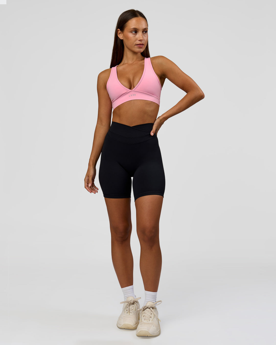Woman wearing Solstice High-Rise 6" Short - Black | Model:Brylee | Size:XS - view 3