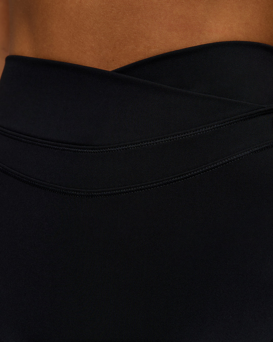 Woman wearing Solstice High-Rise 6" Short - Black | Model:Brylee | Size:XS - view 6