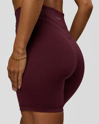 Woman wearing Solstice High-Rise 6" Short - Cherry Lacquer | Model:Brylee | Size:XS | Thumbnail Index: 7