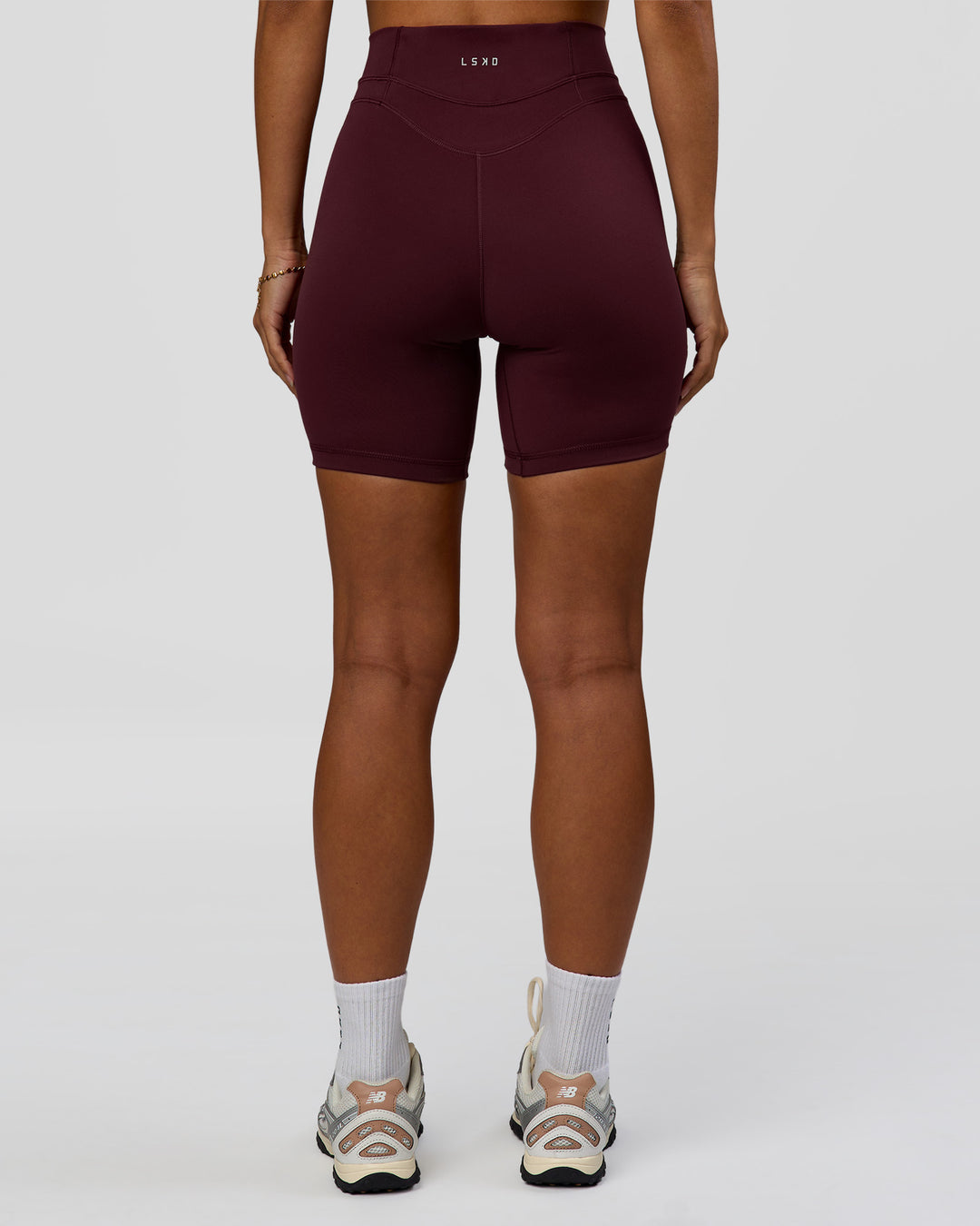 Woman wearing Solstice High-Rise 6" Short - Cherry Lacquer | Model:Brylee | Size:XS - view 9